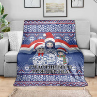 Blue Christmas blanket with Santa and matryoshka dolls, snowflake pattern border stripes