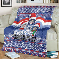 Blue Christmas blanket with Santa and matryoshka dolls, central illustration and banner