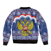 Unisex blue bomber jacket with back graphic of golden double-headed eagle