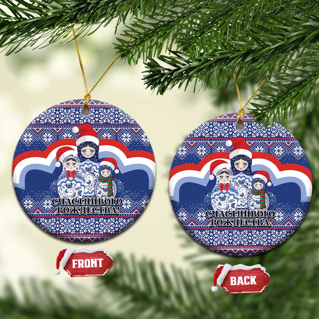Blue ceramic round Christmas ornament with Santa-style matryoshka figures, gold hanging loop
