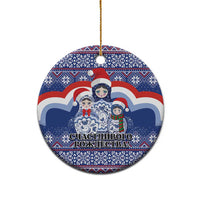 Blue ceramic round Christmas ornament with matryoshka Santa figures and Cyrillic text, gold cord