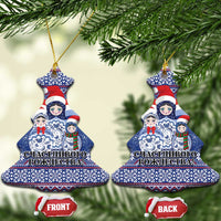 Blue ceramic Christmas tree-shaped ornament with matryoshka Santa figures, gold hanging loop