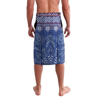 Blue patterned lavalava wrap skirt with ornate folk motifs on the back