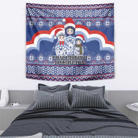 Blue hanging tapestry featuring Santa and nested matryoshka dolls in holiday design.