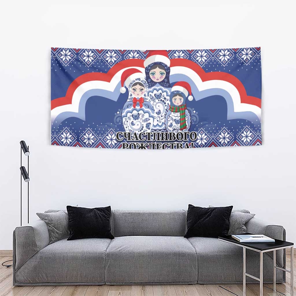 Blue decorative tapestry showing Santa, matryoshka dolls, and repeating folk motifs.