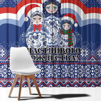 Close-up blue Christmas curtain with matryoshka Santa dolls and “joy” style lettering