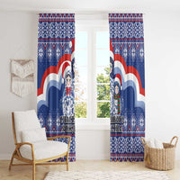Pair of blue Christmas window curtains with matryoshka Santa dolls and bold folk border
