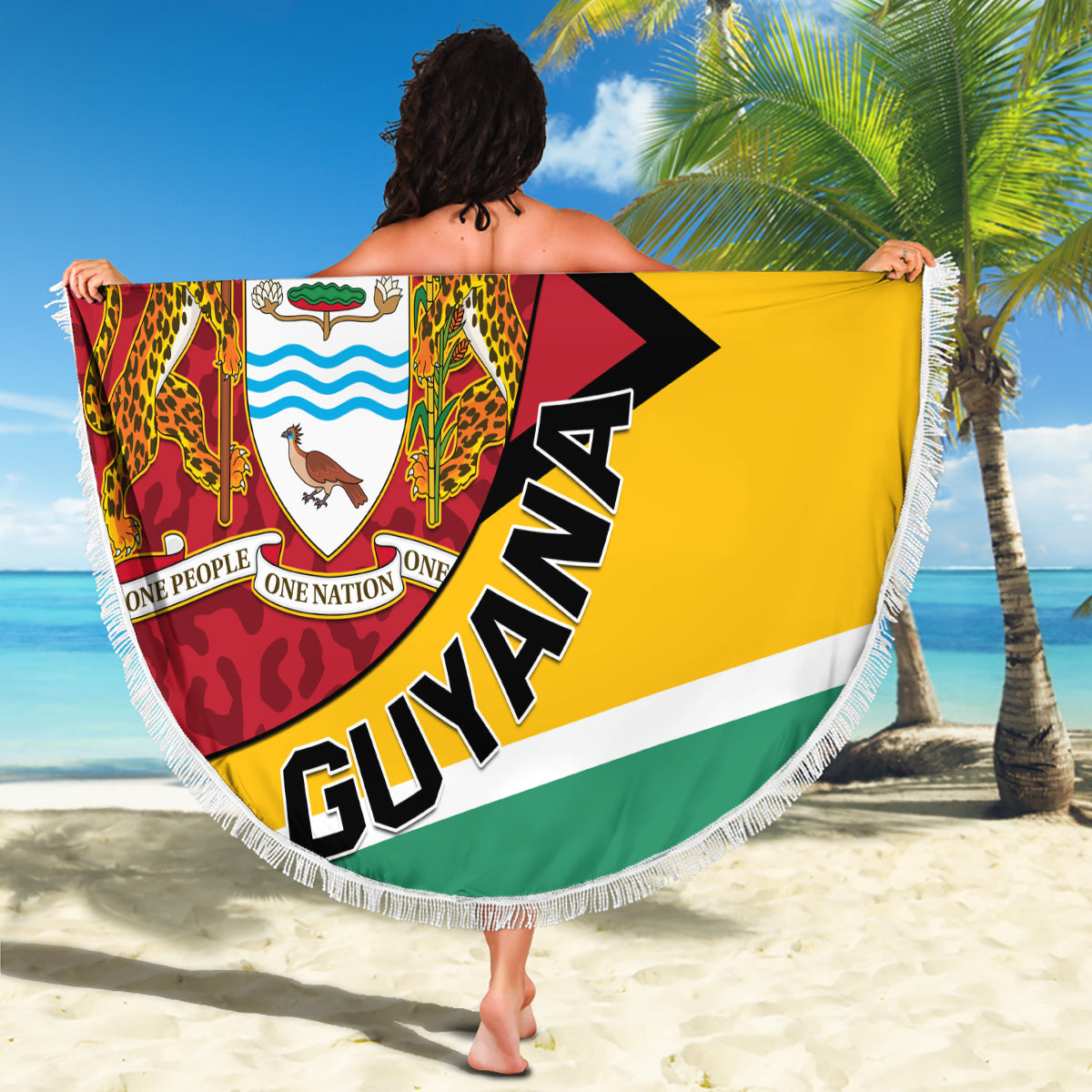 Round Guyana beach blanket held up, showing leopard print and white fringe border