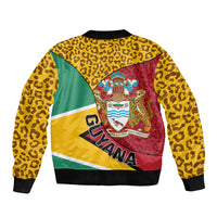 Unisex bomber jacket back with yellow leopard print, Guyana text, crest on multicolor panels