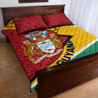 Guyana quilt bed set with coat of arms emblem and leopard pattern; Guyana text on red, yellow, green quilt.