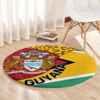 Round Guyana rug on light wood floor: leopard pattern coat of arms with GUYANA text
