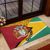 Guyana rubber doormat at doorway, leopard pattern with coat of arms and GUYANA text
