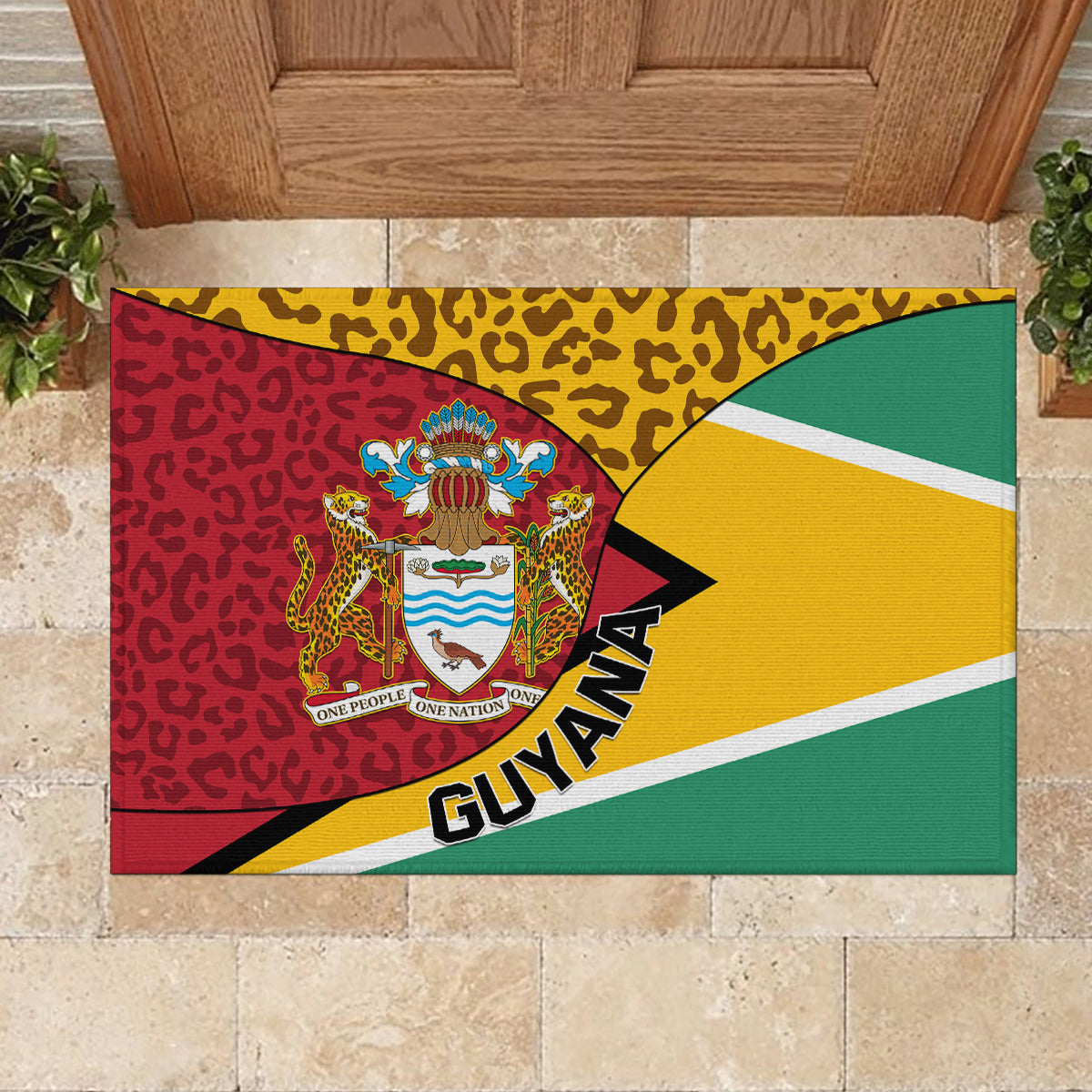 Guyana rubber doormat on stone step, leopard pattern, coat of arms and bold GUYANA