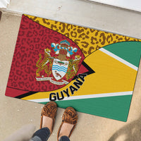 Guyana rubber doormat with leopard design, coat of arms and GUYANA text; feet shown