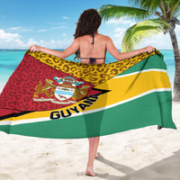Guyana sarong coat, back view, leopard pattern with crest and GUYANA text
