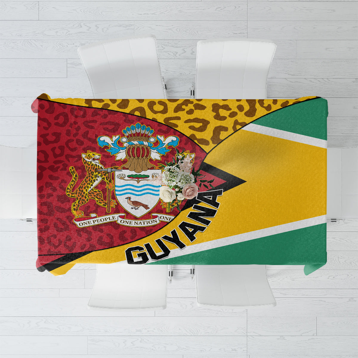 Guyana Republic Day tablecloth with coat of arms and leopard pattern, multicolor blocks.