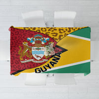 Guyana Republic Day tablecloth with coat of arms and leopard pattern, multicolor blocks.