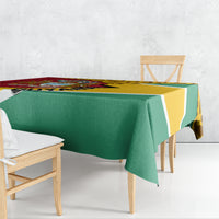 Guyana Republic Day tablecloth, green center with yellow-and-cream geometric border and crest.