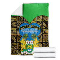 Sierra Leone Independence Day blanket, green backing and black-gold geometric lions emblem