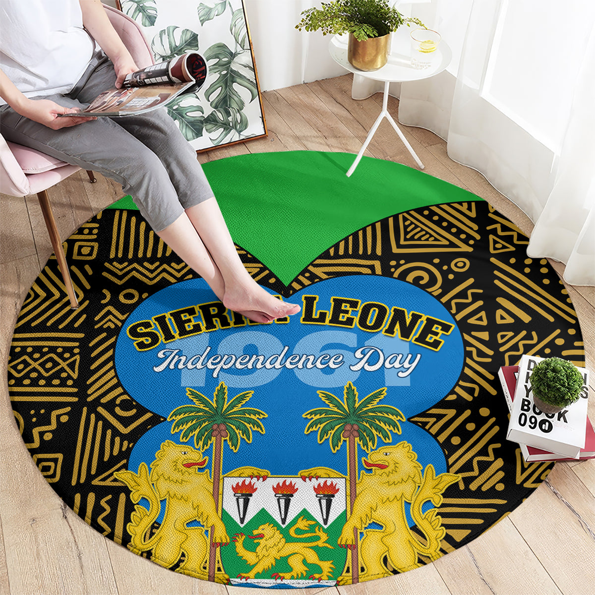 Round carpet with black-and-gold geometric design, green top, blue Sierra Leone Independence Day oval