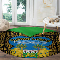 Round carpet with black-and-gold African pattern, green top, blue Independence Day oval and lions