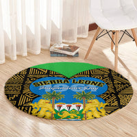 Round carpet with black-and-gold geometric design, green center, blue Independence Day oval