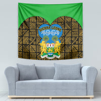 Green and gold African geometric tapestry with central coat of arms, palm trees, and lions