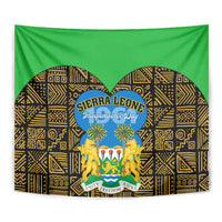Green and gold close-up tapestry showing 'Sierra Leone Independence Day' crest and lion figures