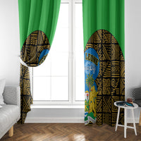 Green window curtain panels with black-gold patterned accents and Sierra Leone Independence Day logo on each side