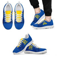 Blue football sneakers with yellow laces and Ukrainian crest, white tread sole