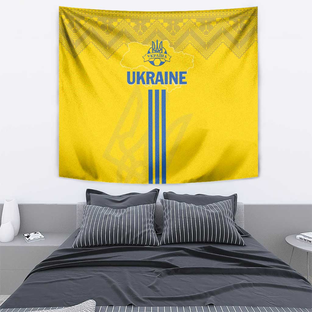 Yellow Ukraine wall tapestry with 'UKRAINE' lettering, trident crest, and blue stripe motif