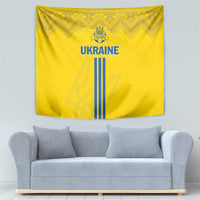 Yellow Ukraine tapestry featuring 'UKRAINE' text, trident crest, and blue vertical stripes