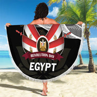 Round beach blanket held up, black with red/white Revolution Day Egypt design and fringe
