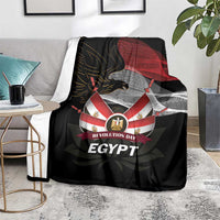 Black eagle blanket draped with red flag and gray wave pattern, 'REVOLUTION DAY' and 'EGYPT'
