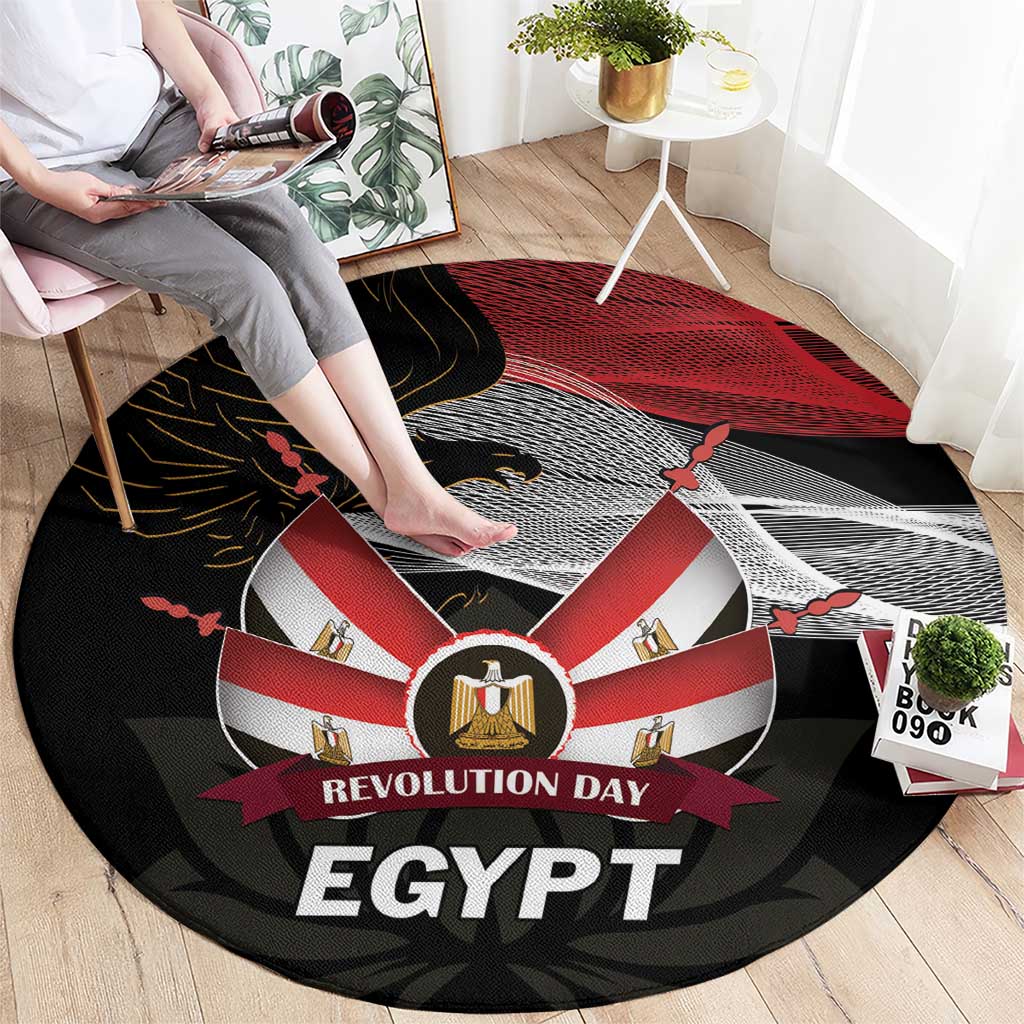 Round black carpet featuring red-and-white ribbon, eagle graphic, and 'REVOLUTION DAY EGYPT'