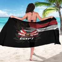 Black sarong, back view, red/white Egypt emblem with eagle and lotus