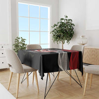 Black dining tablecloth with red accent stripe and geometric eagle artwork