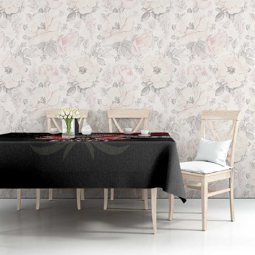 Black tablecloth with red border line and partial eagle lotus graphic