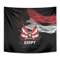 Black tapestry close view of eagle emblem with flags and “Revolution Day Egypt”