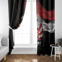 Black window curtain panels with Egyptian flag and eagle print over window