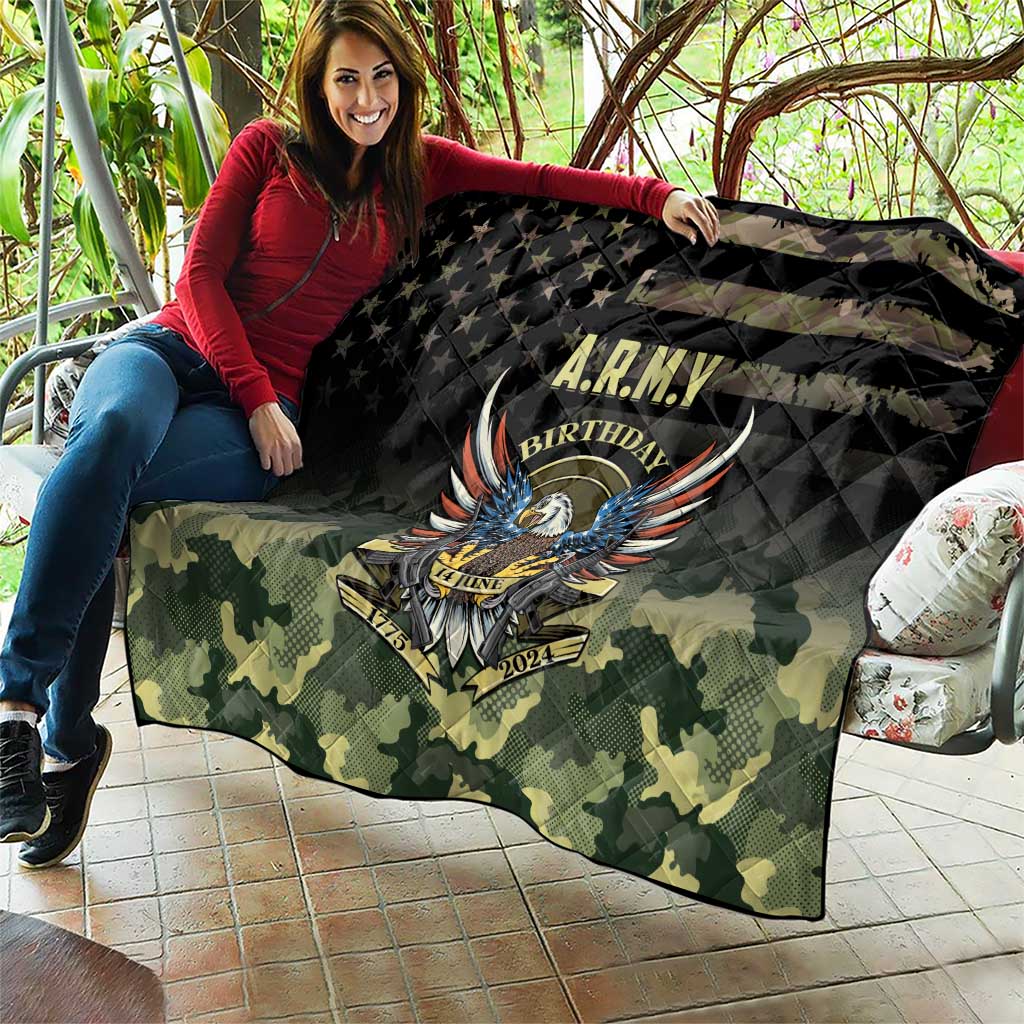 Folded camouflage quilt in black with A.R.M.Y Birthday eagle graphic and star stripe