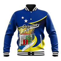 Blue baseball jacket with striped rib trim, snap front, and Curacao crest and map graphic