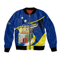 Blue unisex bomber jacket with front zip, ribbed cuffs, and Curacao crest graphic panel
