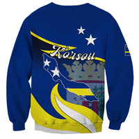 Blue crewneck sweatshirt with map and stars graphic on back, long sleeves