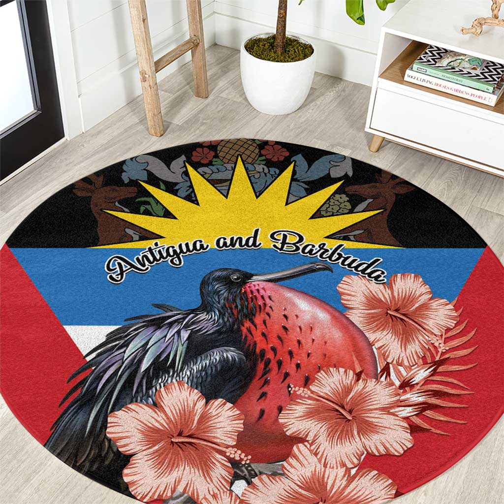 Round area rug with black, red, and blue bird and hibiscus flower graphic