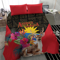 Red bedding set with deer fawn and tropical blooms graphic on dark geometric center panel