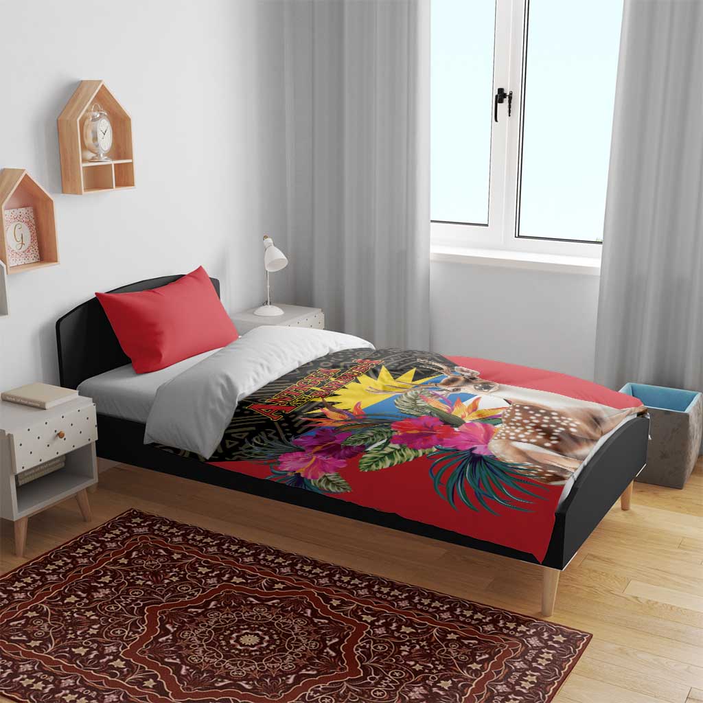 Red duvet and pillowcases with deer and tropical bouquet print on dark geometric fabric