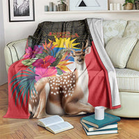 Antigua and Barbuda tropical deer print blanket on sofa, red with bright flower foliage