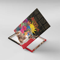 Unframed canvas wall art angled view with deer, tropical flowers, and Antigua and Barbuda text
