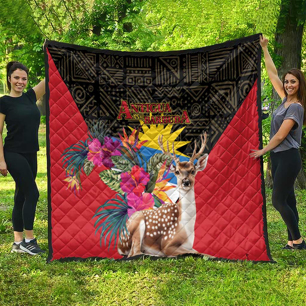Large red and black quilt blanket with deer, tropical bouquet, and Antigua and Barbuda logo